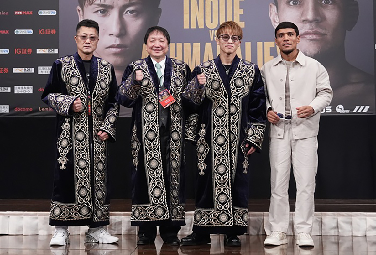 Murodjon Akhmadaliev presented Naoya Inoue and his team with ceremonial Uzbek robes as gifts at this week's news conference in Japan. Photo: Naoki Fukuda for Top Rank