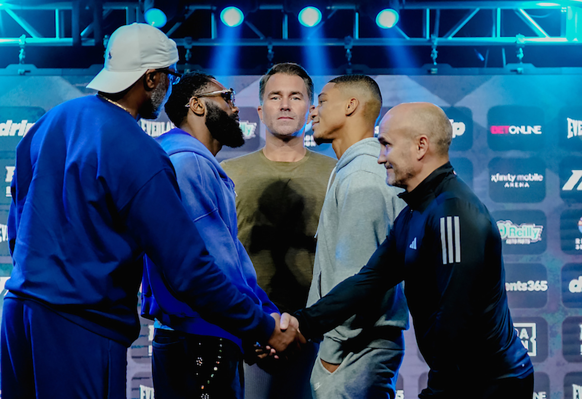 The fighter face off while their trainers shake hands. Photo: Emma Brawley Matchroom Boxing