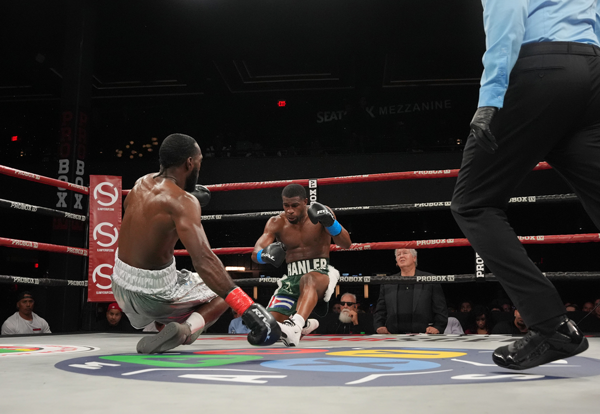 It was a shocker when both Joeshon James and Yojanler Martinez hit the canvas together. They were just as surprised. Photo: ProBox Ramon Cardenas