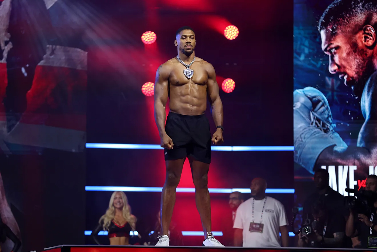The pressure is squarely on the decorated former heavyweight champion and Olympic gold medalist, who is expected to win. Photo: Megan Briggs, Getty Images For Netflix