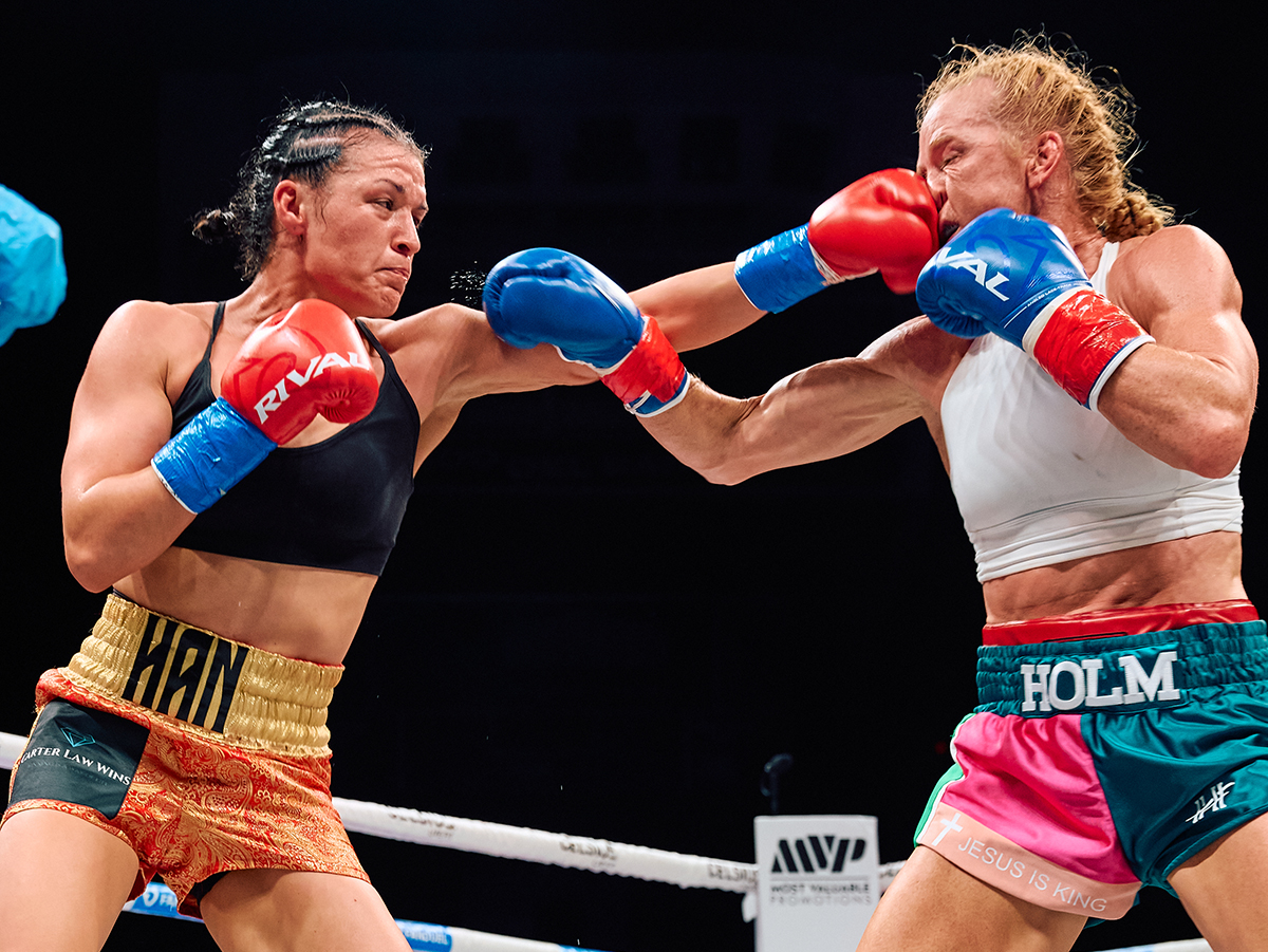 Stephanie Han was on her way to a win over Holly Holm, but a cut caused the fight to go to the scorecards after seven rounds. Photo: Harry Aaron, Most Valuable Promotions