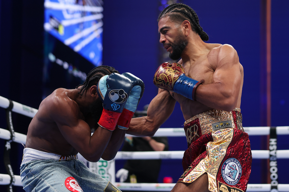 Raymond Muratalla worked to pressure Andy Cruz using high level body punching. Photo: Cris Esqueda Matchroom Boxing
