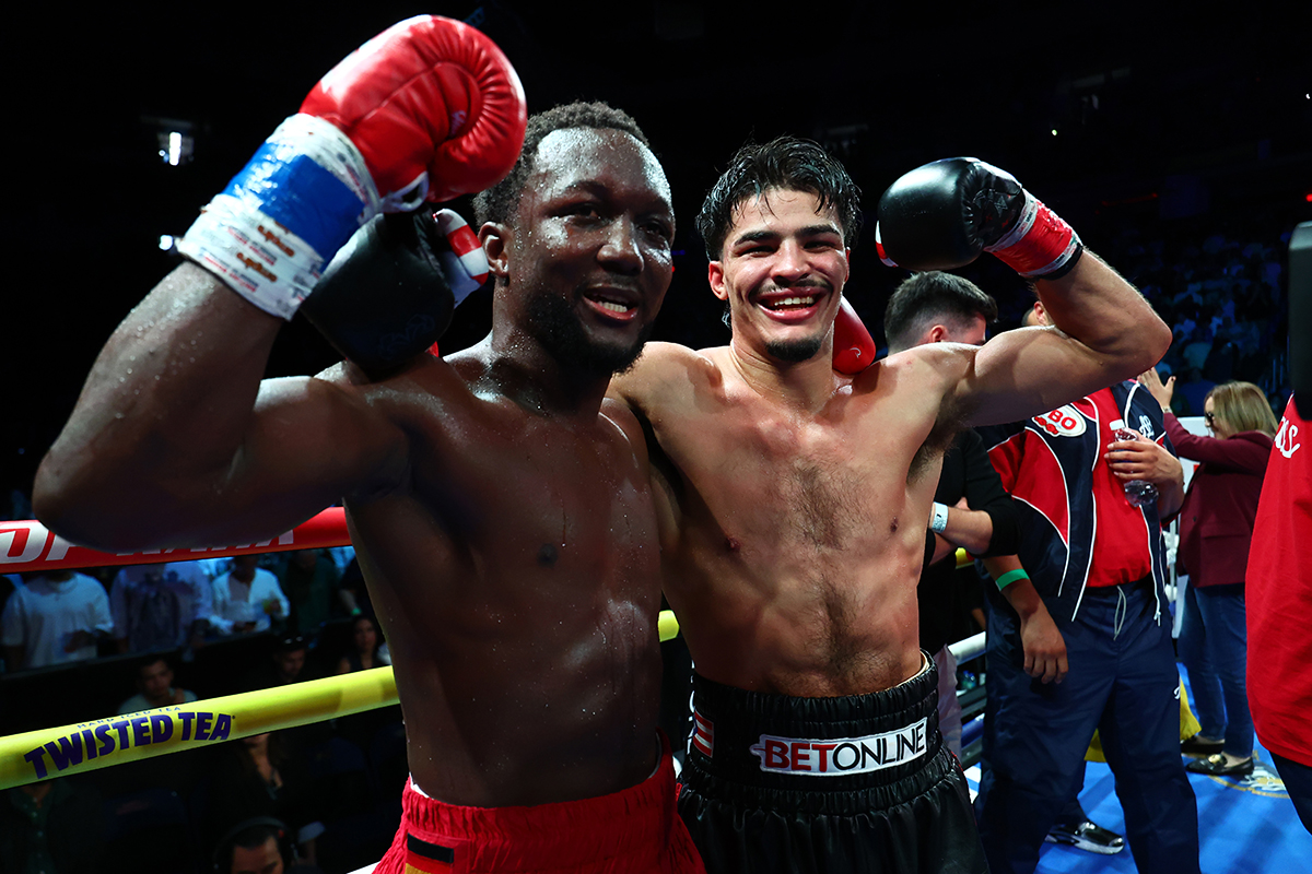 The two longtime sparring partners were all business in the ring, and friends again after the bell. Photo: Top Rank Boxing