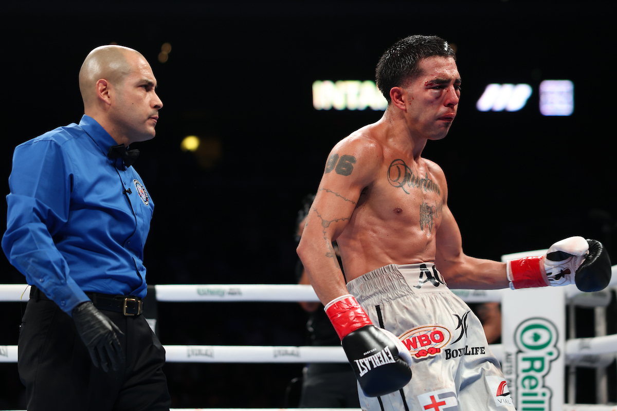 Agustin Quintana deserved to continue on, but it wasn't likely he would finish on his feet. Photo: Cris Esqueda, Matchroom Boxing