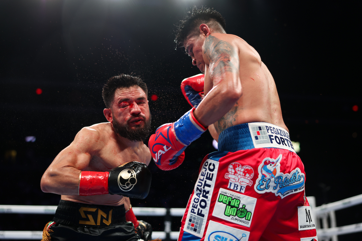Finally, the damage was too great to let Eduardo “Sugar” Núñez continue. Photo: Cris Esqueda, Matchroom Boxing