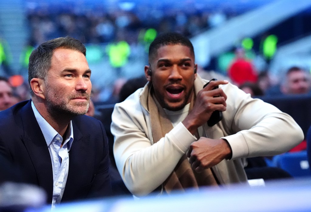Matchroom Sport promoter Eddie Hearn and former world heavyweight champion Anthony Joshua keep an eye on the action Saturday. Photo: Chris Dean, Boxxer Tyson Fury