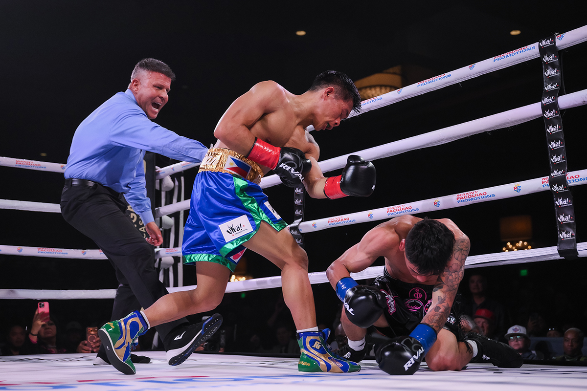 Pedro Taduran drops Gustavo Perez for the first of four knockdowns as referee Thomas Taylor rules Perez down. Photo: Manny Pacquiao Promotions