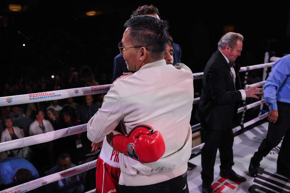 Manny Pacquiao congratulates his son Jimuel on his first professional win and first professional knockout. Photo: Manny Pacquiao Promotions