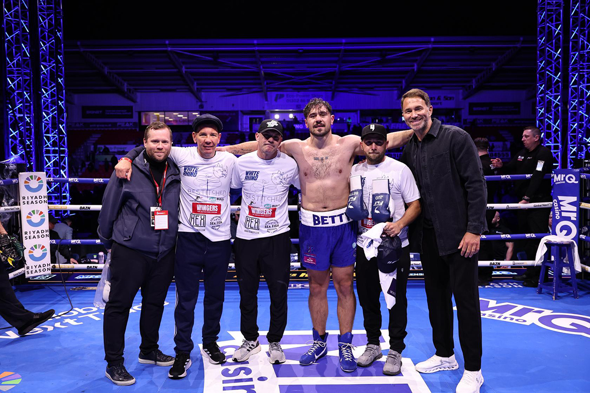 Dave Allen and his tea including trainer Jamie Moore and promoter Eddie Hearn gather for a photo after his fight. Photo: Queensberry Promotions Hrgovic
