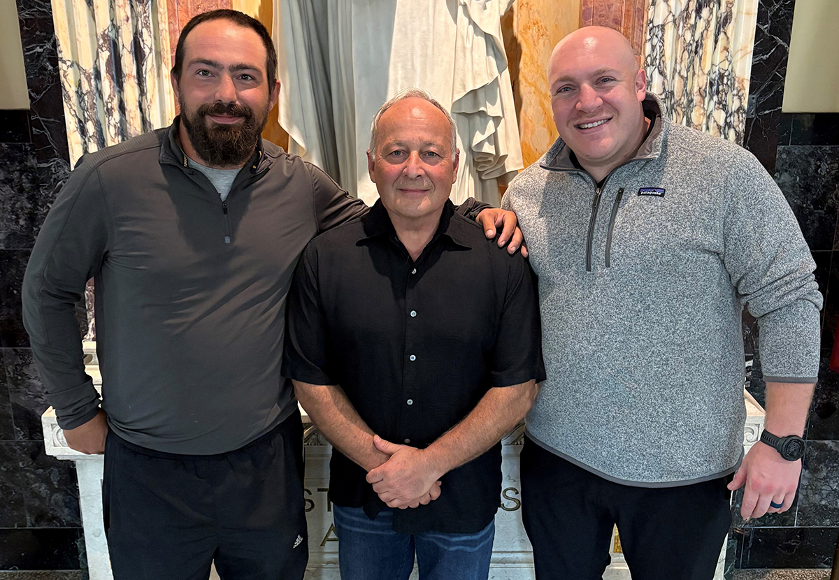 Coach Dom Arioli with Aquinas Institute boxing program alumni Josh Leonardo and Henry Kaester. Photo: Aquinas Institute