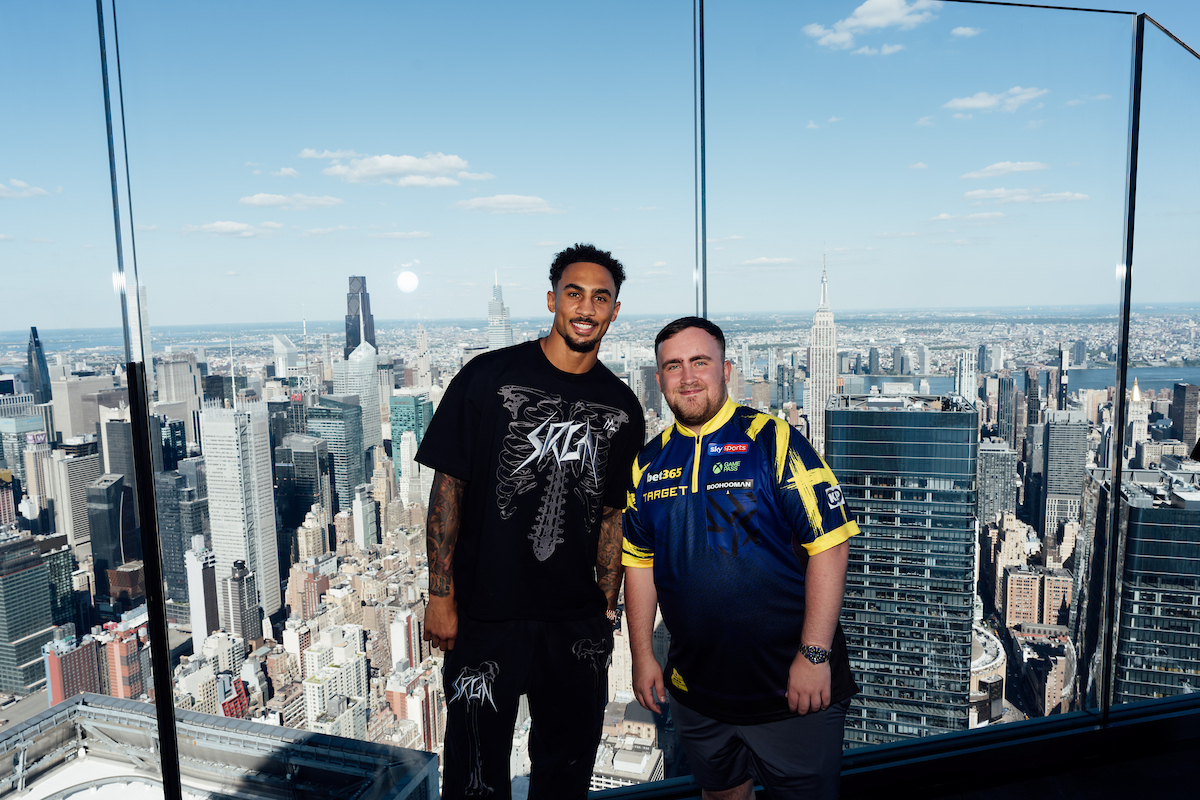 Name the record breaking world champion in this photo. It's not the guy on the left. Light heavvyweight Ben Whittaker makes his U.S. debut on the Zayas vs Boots undercard, and his pal Luke Littler competes in the U.S. World Darts Championship. Littler is a huge boxing fan. Photo: Matchroom Boxing