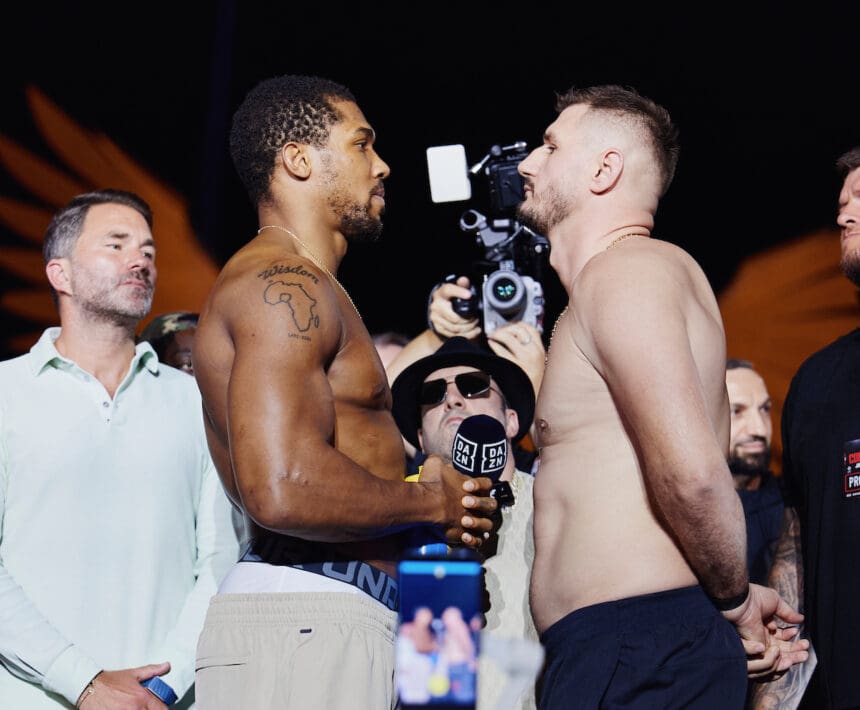 Anthony Joshua and Kristian Prenga in their final faceoff at Friday's weigh-in ahead of their heavyweight fight, Photo: Mark Robinson, Matchroom Boxing