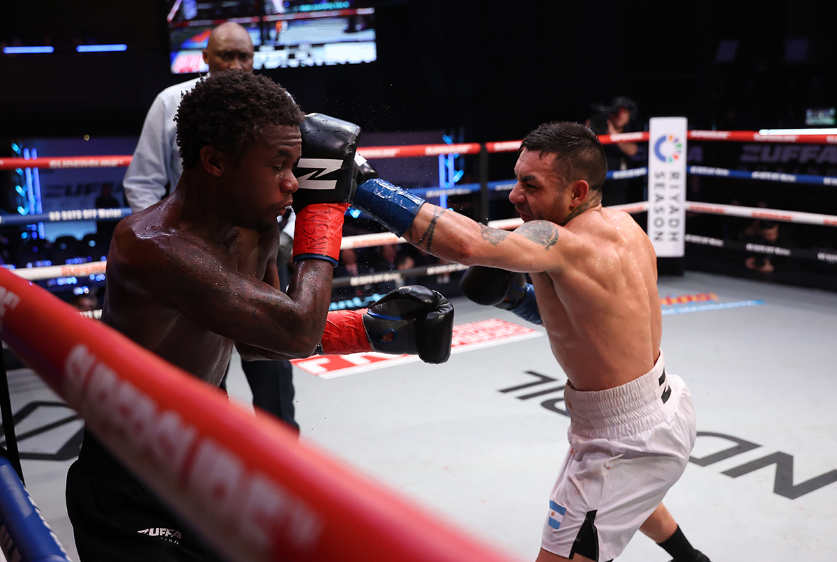 A determined Edgar Sosa handed Dominique Francis his first loss with a strong performance including a knockdown at the Infosys Theater at Madison Square Garden on Sunday. Photo: Ed Mulholland, Zuffa Boxing 09