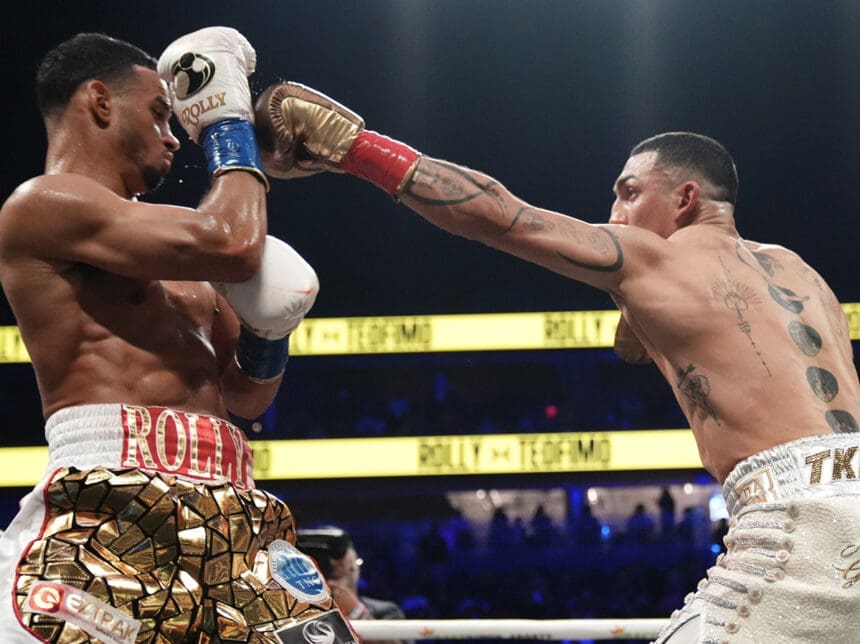 Teofimo Lopez Jr. kept Rolly Romero's best weapons from doing damage with a disciplined performance. Photo: Premier Boxing Champions