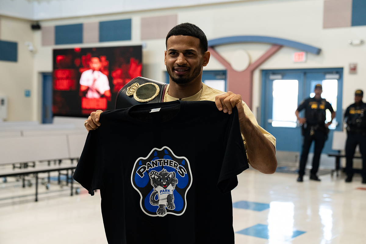 Rolly Romero shows off his "Panther Pride" at a visit to his former Las Vegas elementary school on Friday. Photo: Ryan Hafey, Premier Boxing Champions