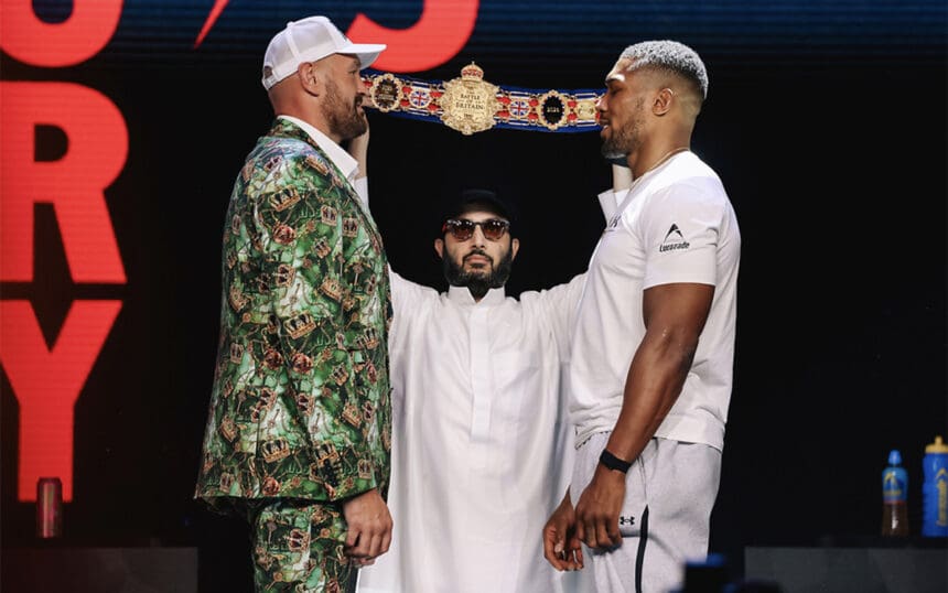 Tyson Fury and Anthony Joshua have their first faceoff Wednesday in London, with Turki Alalshihk holding the RING Magazine belt. Photo: Zacharias Delgado, Matchroom Boxing