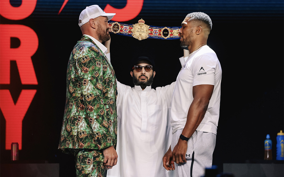 Tyson Fury and Anthony Joshua have their first faceoff Wednesday in London, with Turki Alalshihk holding the RING Magazine belt. Photo: Zacharias Delgado, Matchroom Boxing