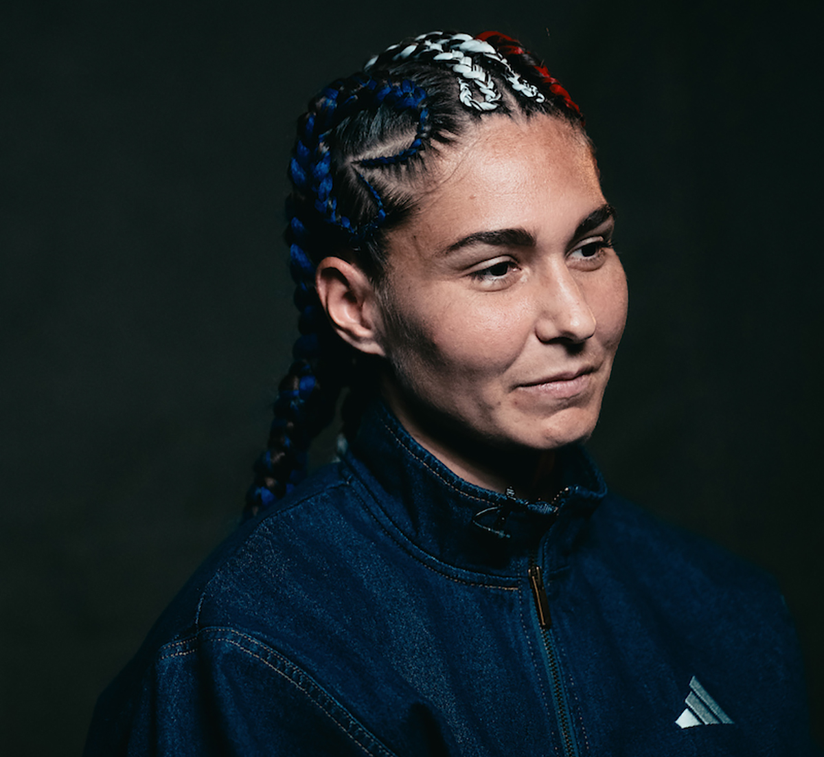 Flora Pili, with her hair braided in the colors of the French flag, has nothing to lose on Saturday. Photo: Matchroom Boxing