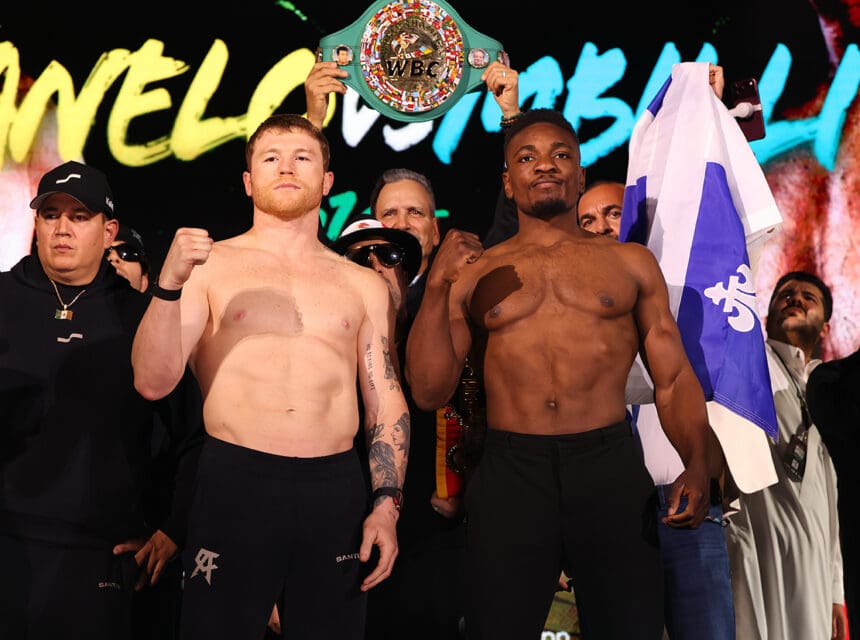 Canelo Álvarez and Christian Mbilli in their final appearance at Friday's Ring Magazine and Riyadh Season weigh In event before their title fight on Saturday. Photo: Mark Robinson, Canelo Promotions