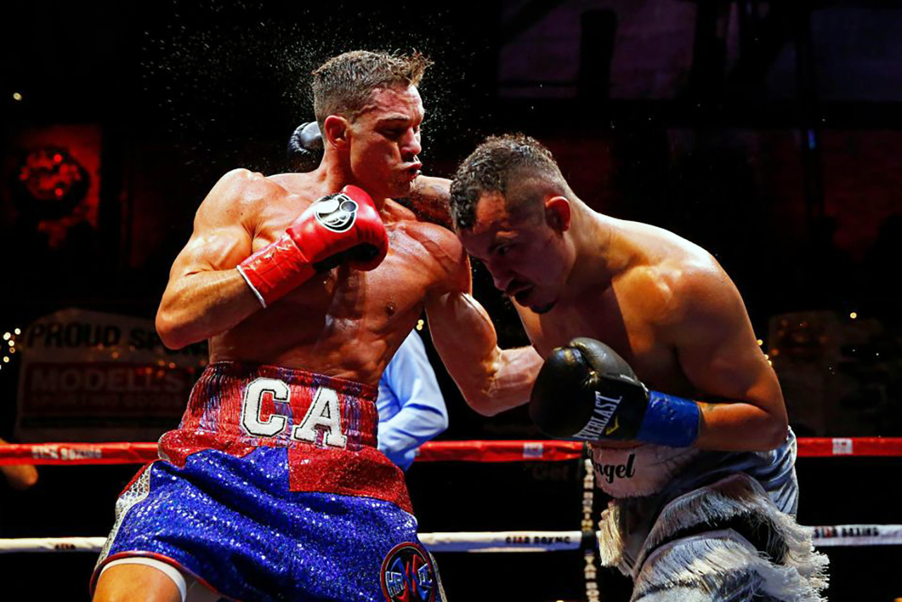 Chris Algieri lands a body shot against Angel Hernandez at The Paramount in 2018. Photo: NIck Sideris Photography/@BoxPicsNS Joe DeGuardia