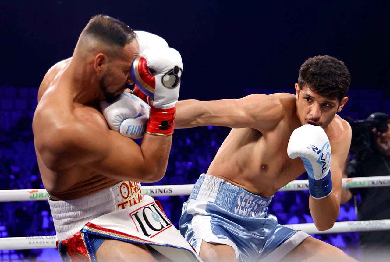 Sebastian Fundora doesn't always employ his substaintial height and reach advantage, enjoying a firefight now and then. Photo: Premier Boxing Champions