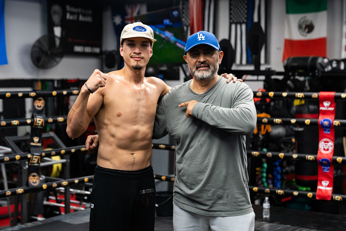 Winning team: Brandon Figueroa prepares for his first title defense on Oct. 17 with trainer Manny Robles in Los Angeles. Photo: Ryan Hafey, Premier Boxing Champions