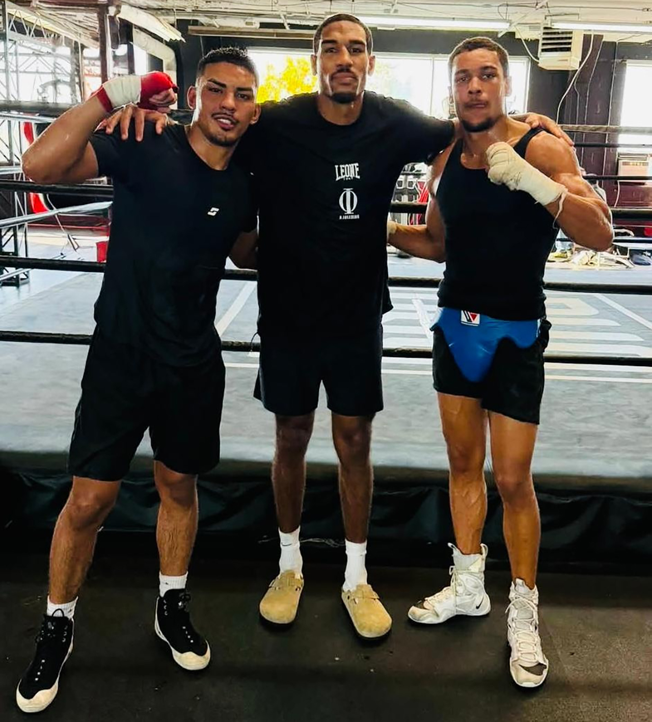 Marco Romero got his chance to spar with Osleys Iglesias (center) and undefeated super middleweight prospect Wilkens Mathieur (right) prior to their victories on October 8 in Quebec. Photo: Kansas Boxing Academy