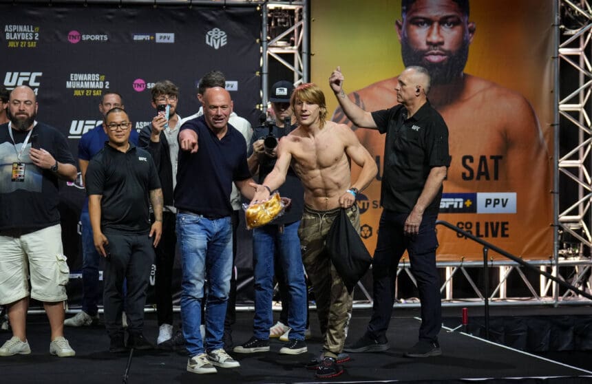Paddy Ôthe BaddyÕ Pimblett of GBR throws gifts to the crowd during the ceremonial weigh-ins during the UFC 304 event at Co-op Etihad Campus, SportCity, England on the 26 July 2024. Copyright: xAndyxRowlandx PMI-6349-0004